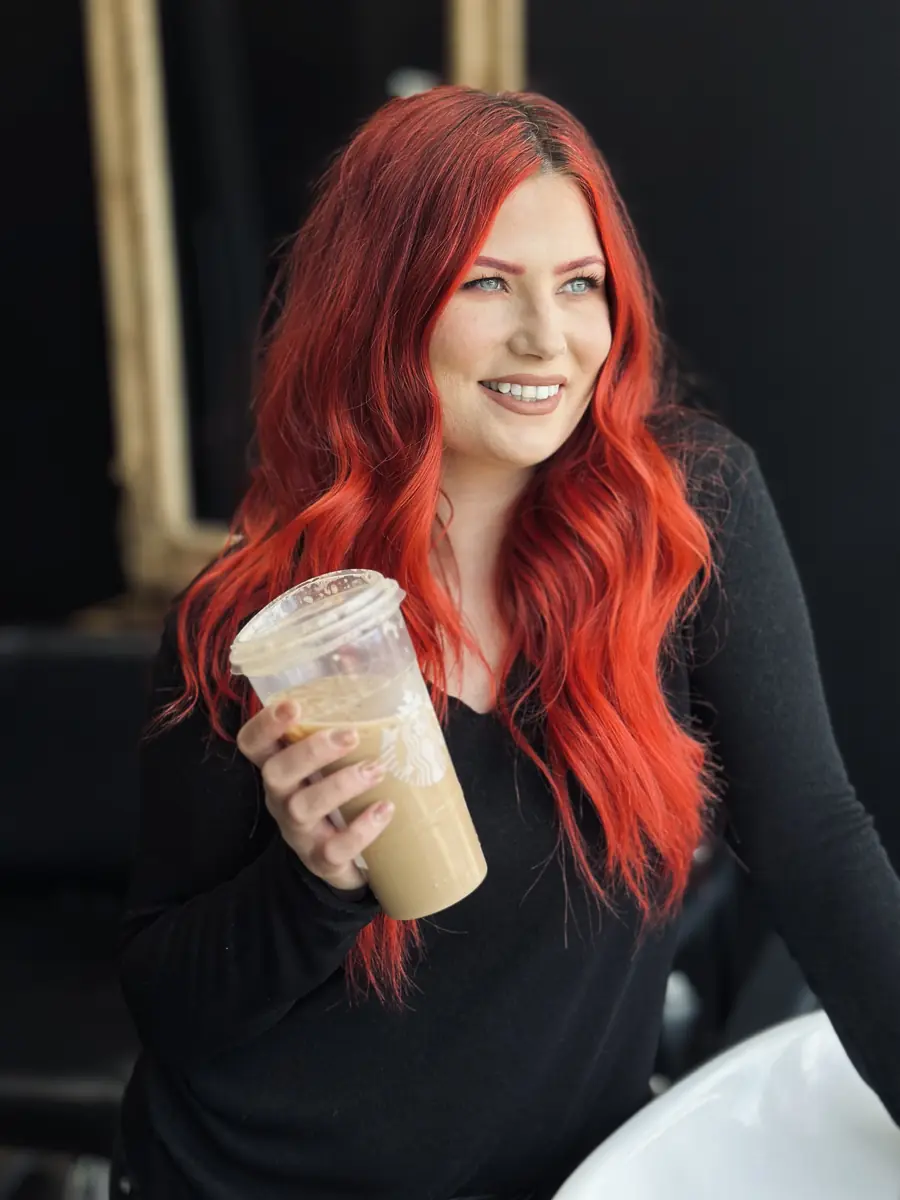 Timillia, Clovis hairstylist and extension specialist, in her studio