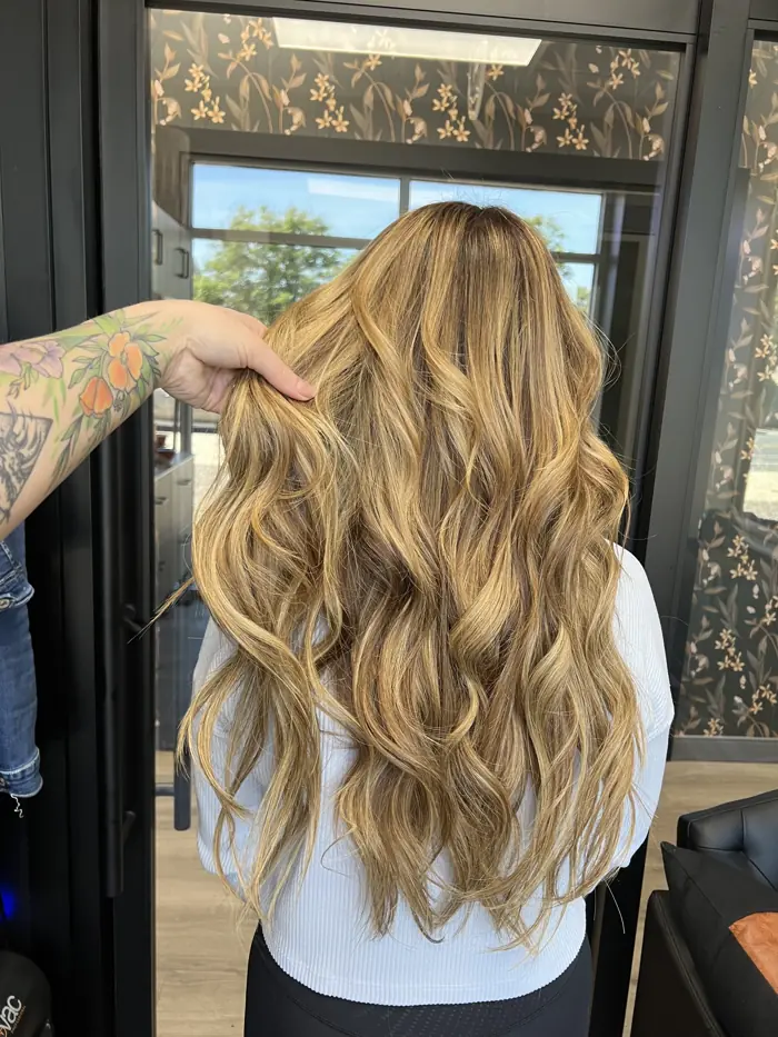 Hand-tied extensions with golden blonde balayage, Clovis CA